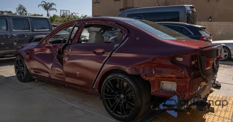 2018 BMW M5 z USA, uszkodzony, nr VIN WBSJF0C55JB283553